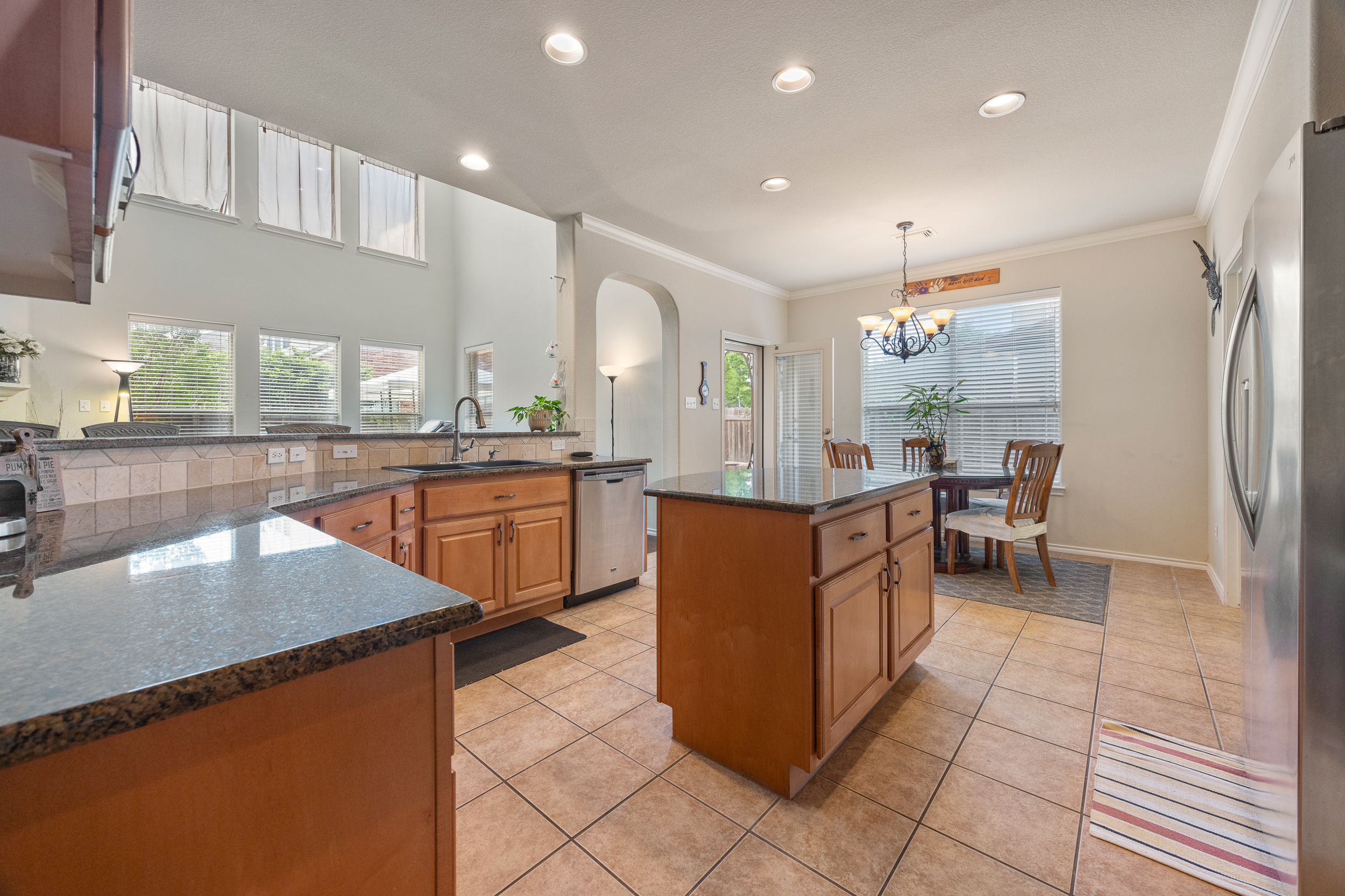 Spacious kitchen with center island and dining area