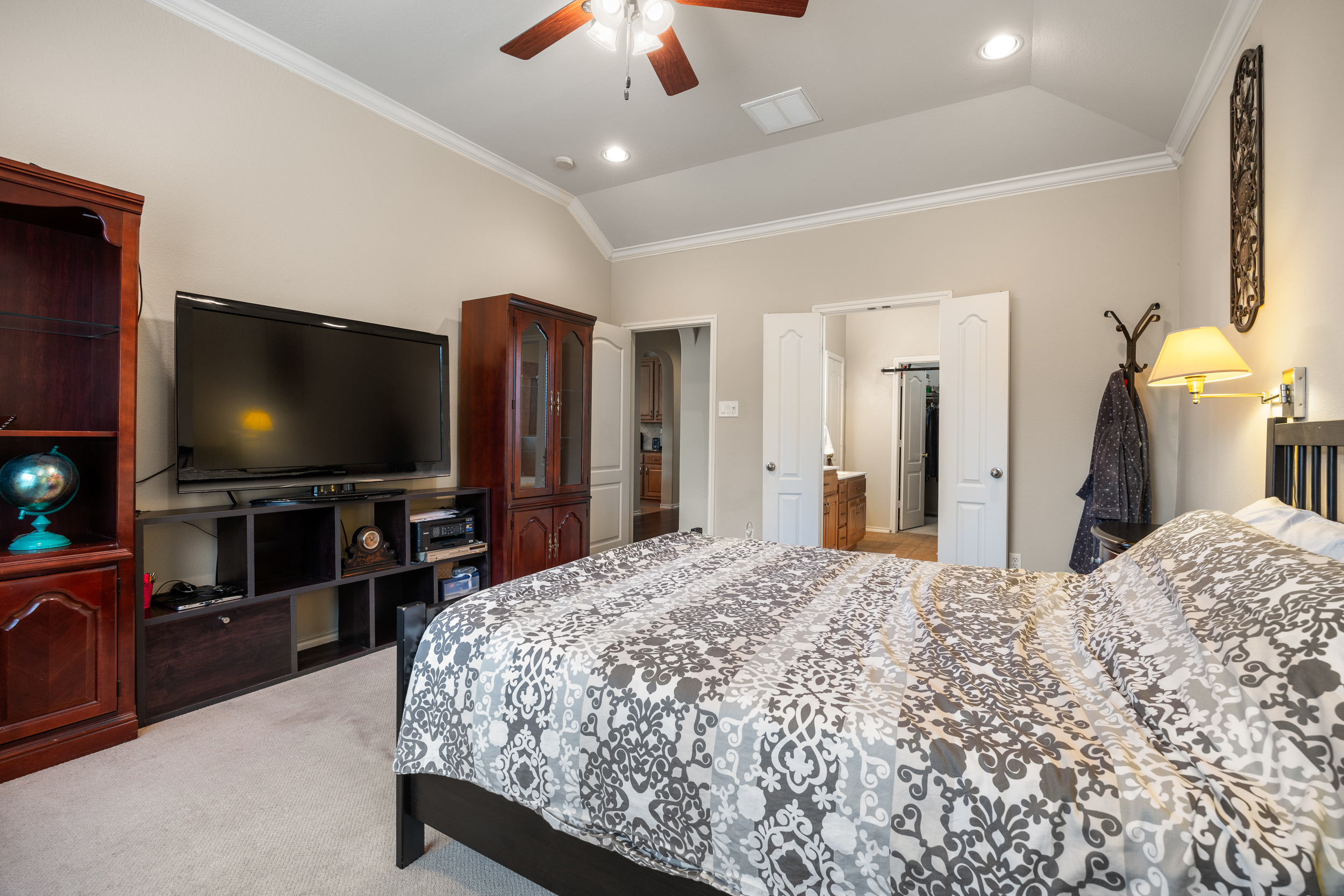 Master bedroom with raised ceiling